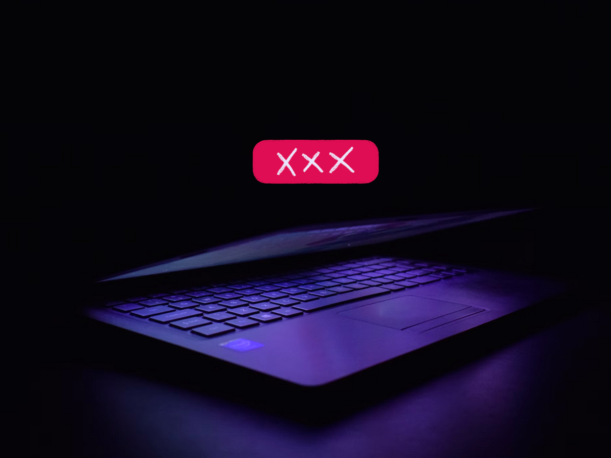 Laptop and XXX symbol