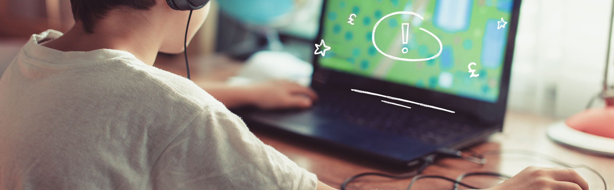 Child playing a game on laptop