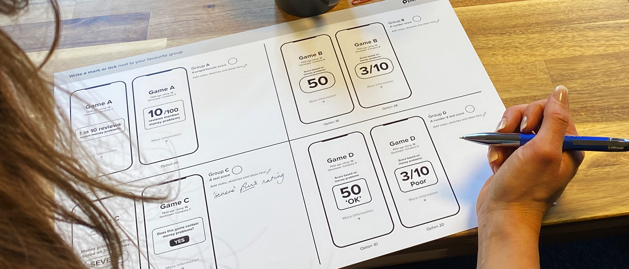 Tester looking at our design concepts
