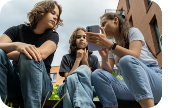 Children playing with a digital device