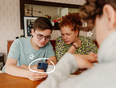 Parent with sons at table