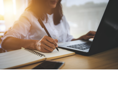 Person doing research on laptop
